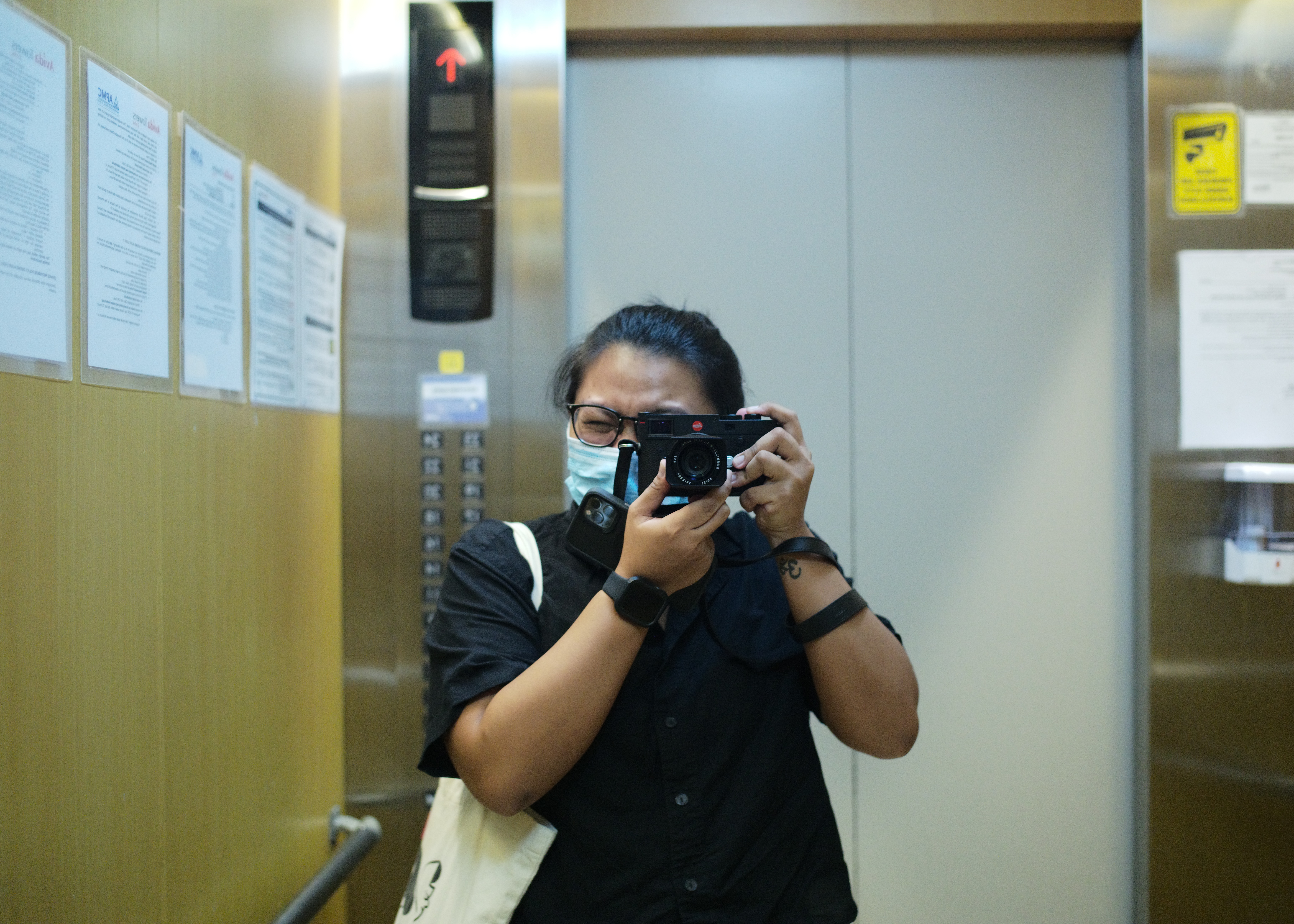Mirror selfie in an elevator